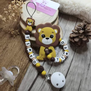 Attache tétine + anneau Thème lion moutarde - tons marron/beige